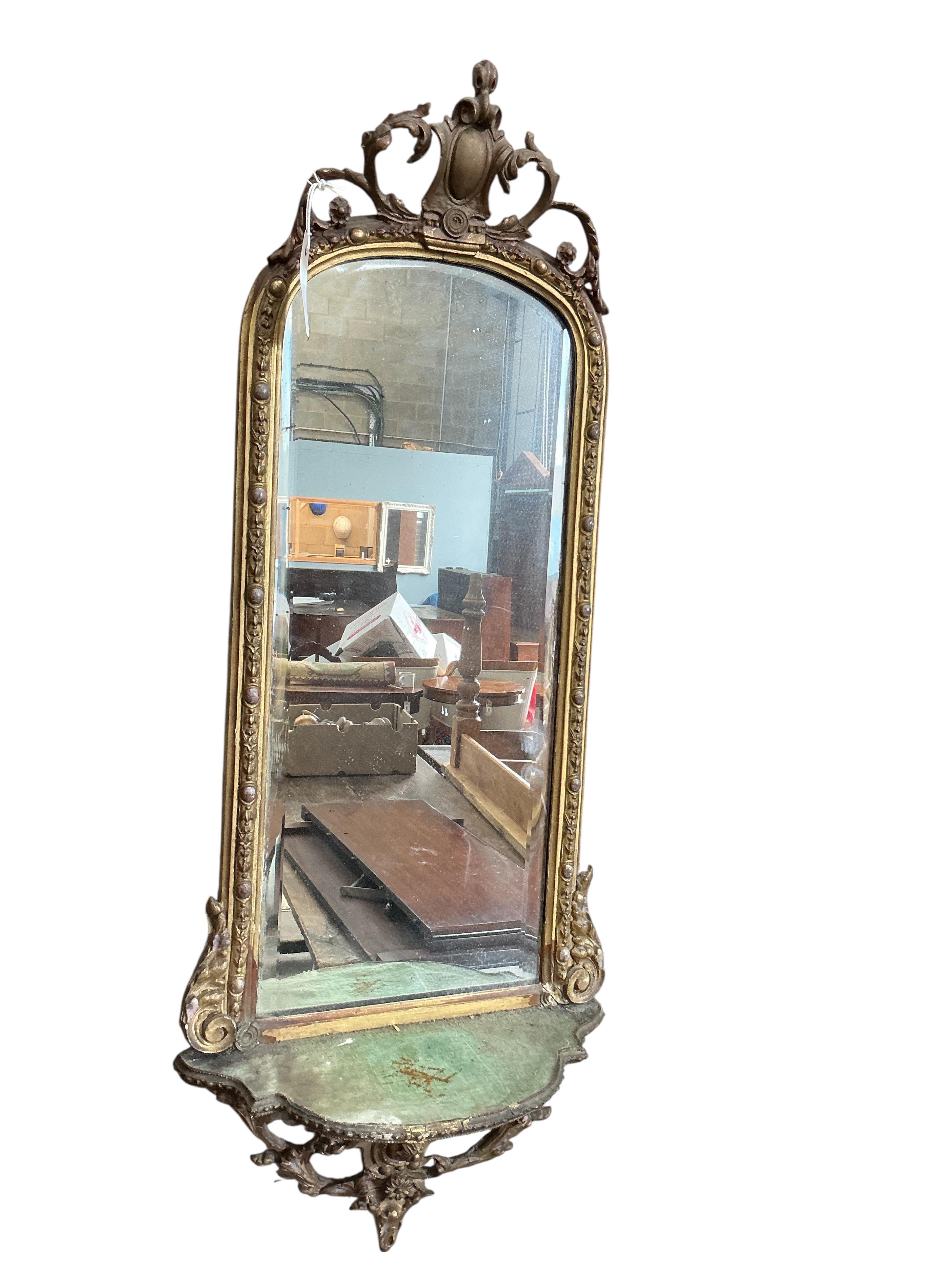 A Victorian giltwood and composition wall mirror, width 38cm, height 98cm
